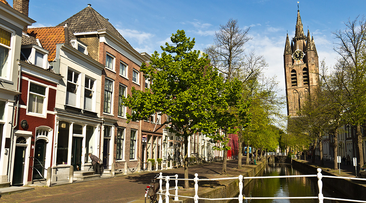 Spy the leaning Oude Kerk as you sip on coffee from Stads-Koffyhuis